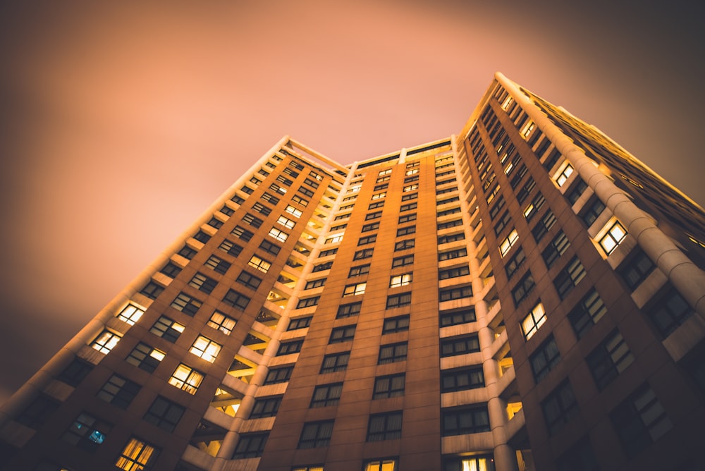 worm's eyeview photo of concrete high-rise buildings