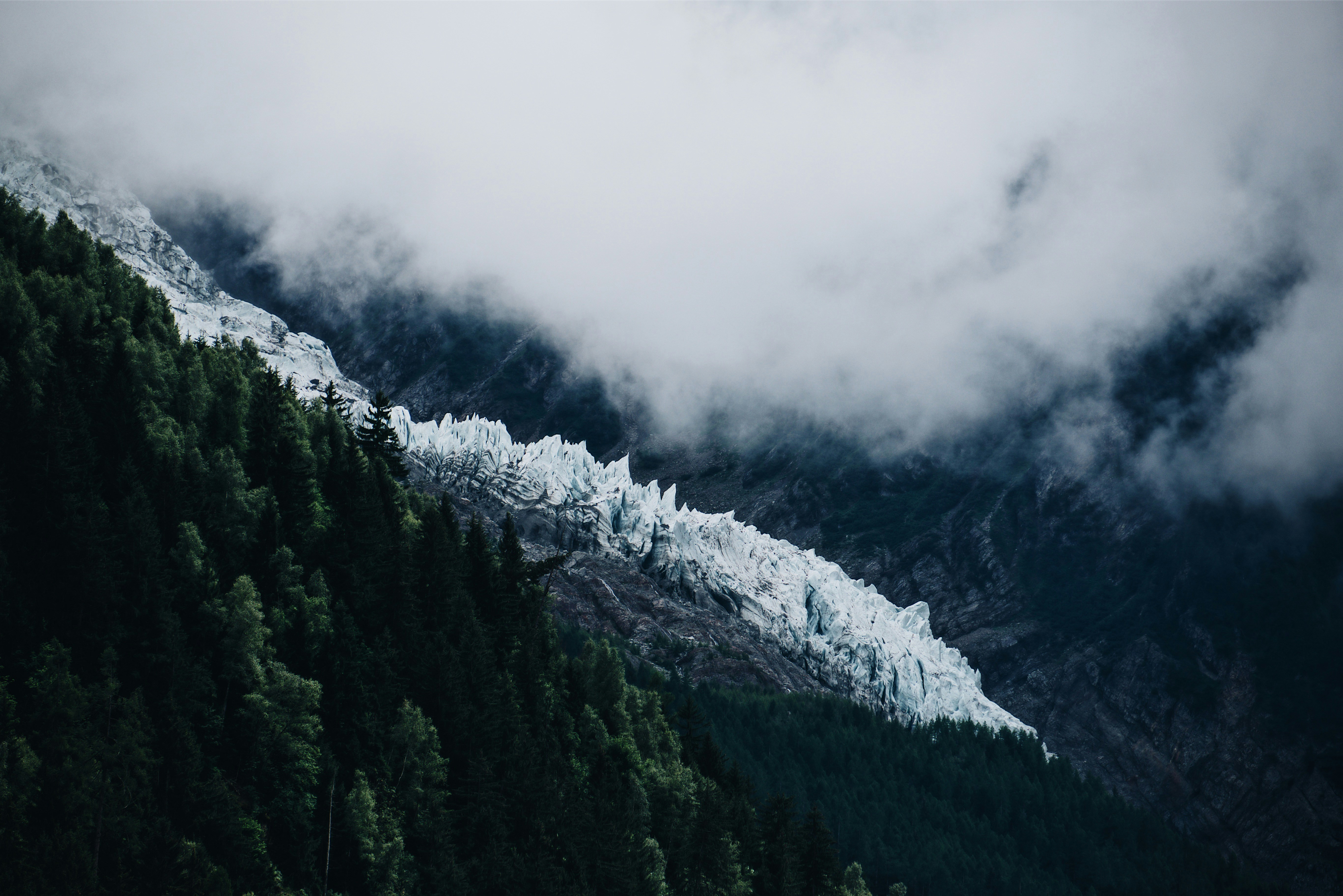 Fog spilling into a mountain canyon.