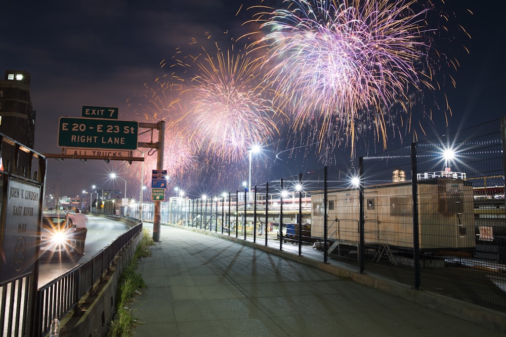 fireworks display over the building during night time