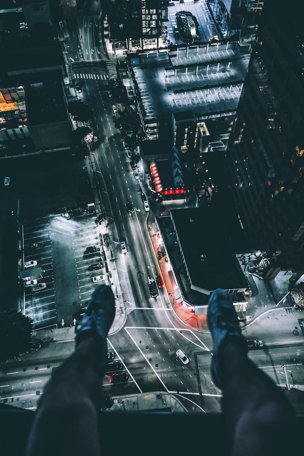 person sitting on top of building