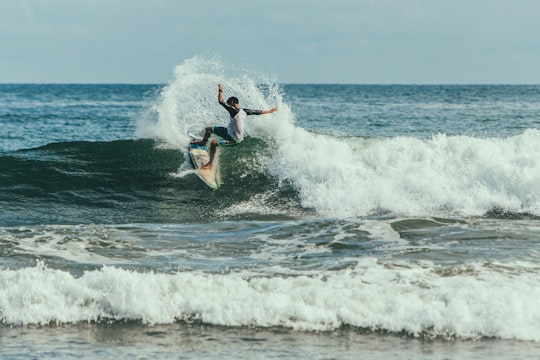 man surfing on waves during daytime in Playa Venao Panama