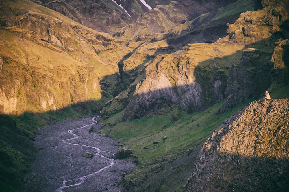 high-angle photography of green mountain and river