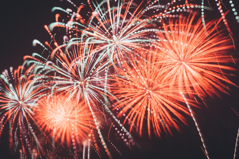 photo of orange and white fireworks