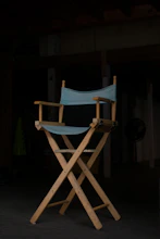 Close-up of a director's chair with 'Ruiz Visuals' embroidered on the back.