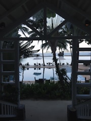A serene view of the hotel pool from the room.