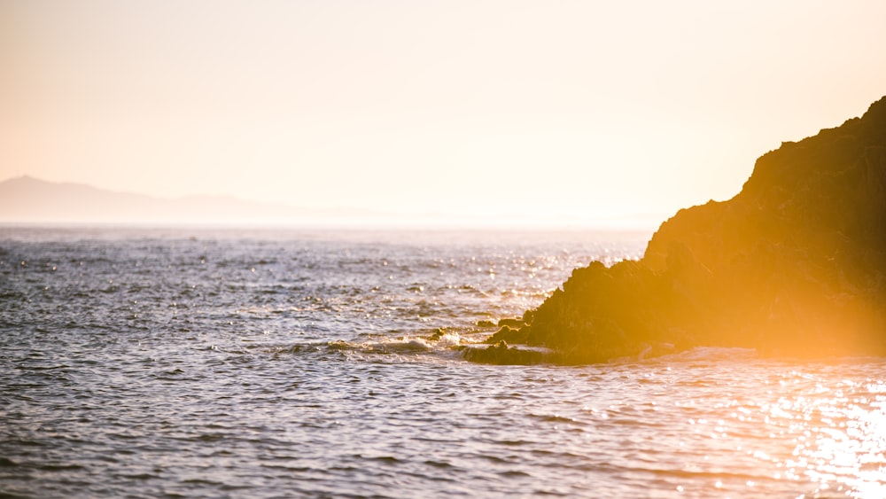 photo of island near body of water