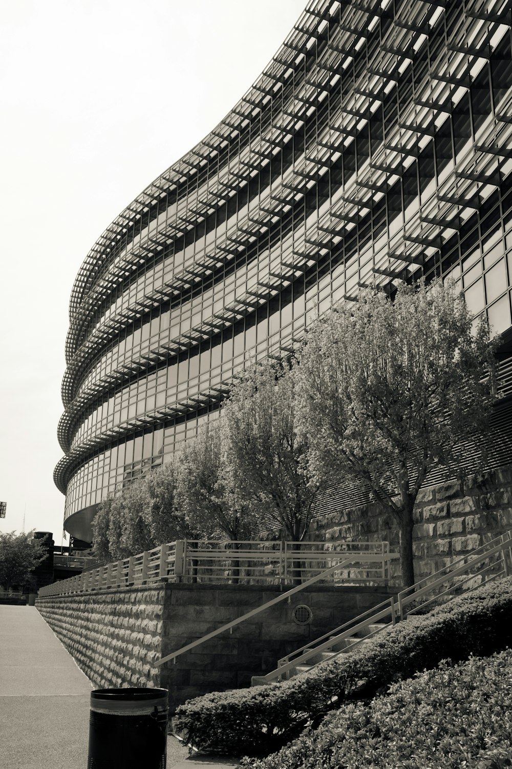 grayscale photo of curtain building