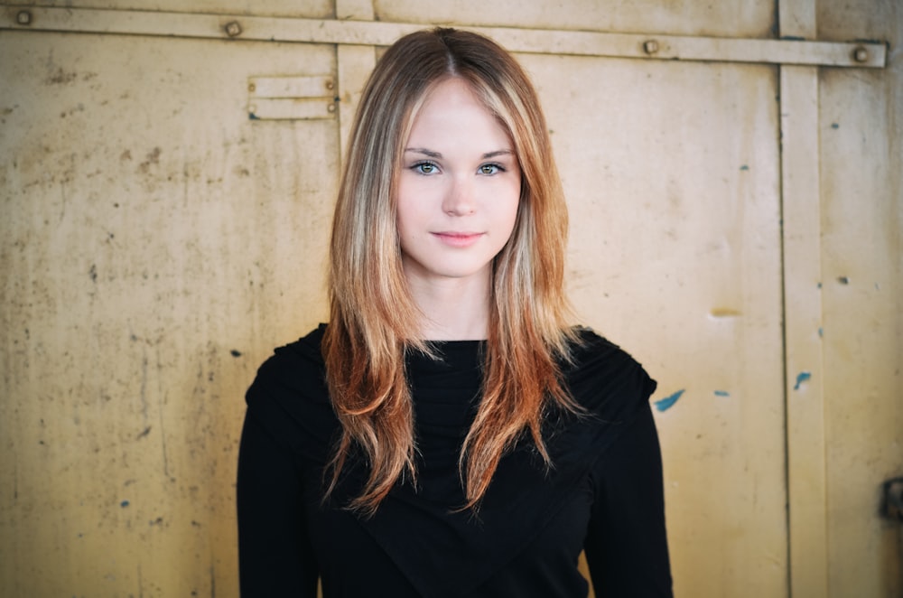 portrait photography of woman wearing black sweatshirt