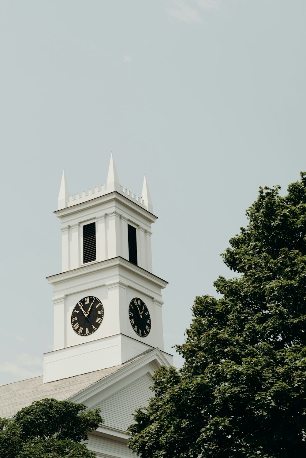 white clock tower showing 11:05