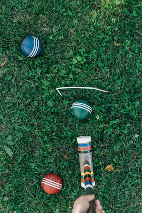 person playing croquet