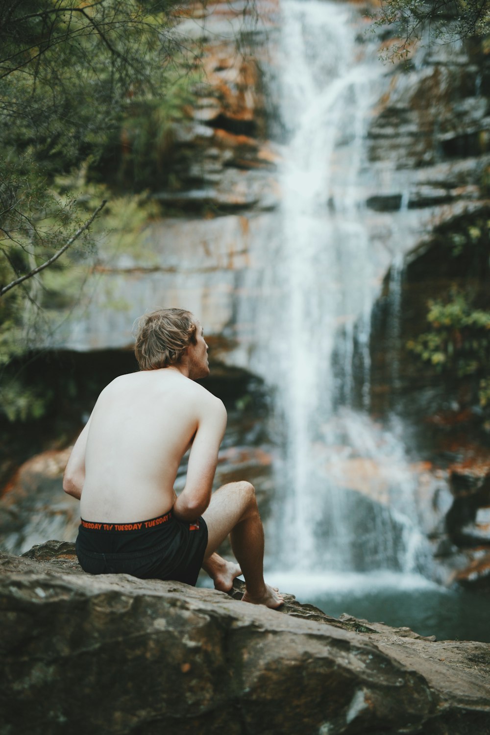 man wearing black shorts