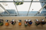 aerial view of person sitting on chairs