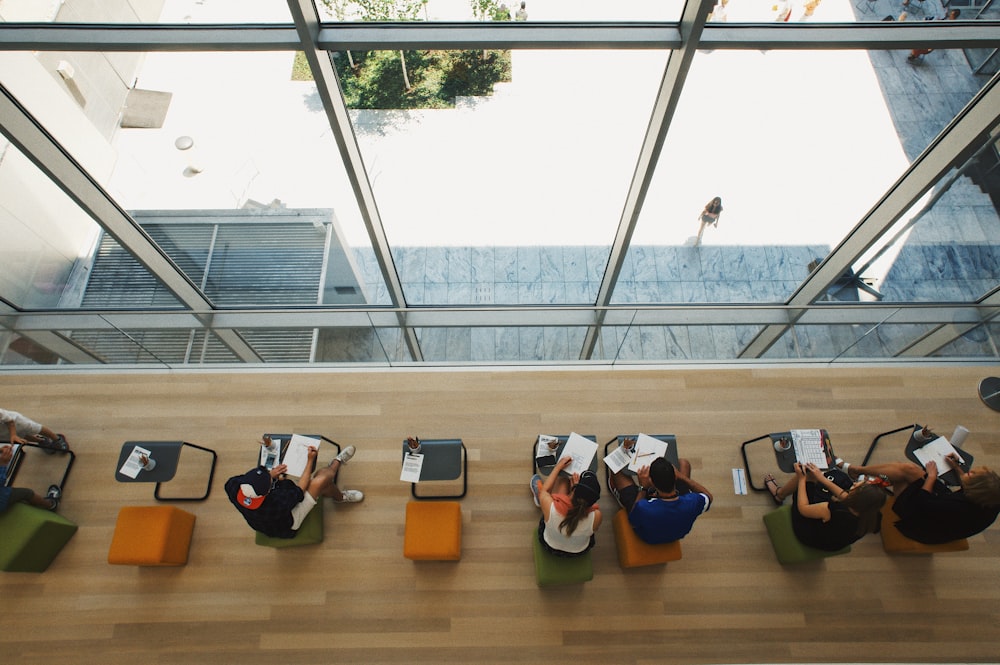 aerial view of person sitting on chairs