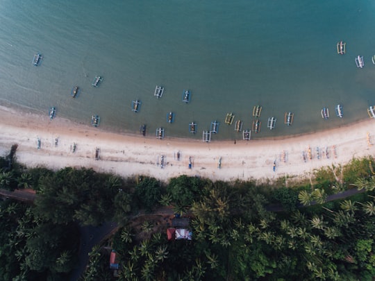 people on seashore during daytime in Belitung Indonesia