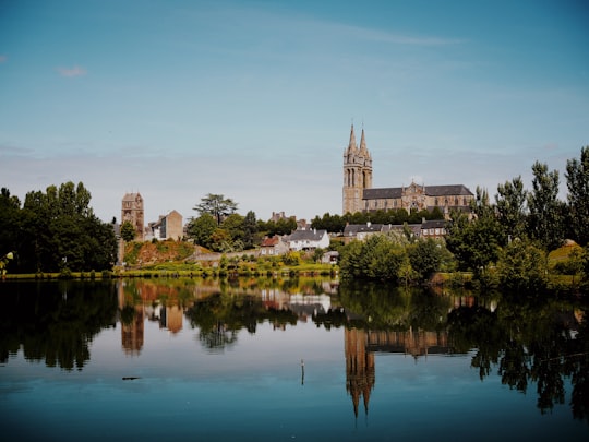 landscape photography of lake surrounded by green leafed trees in Saint-Hilaire-du-Harcouët France