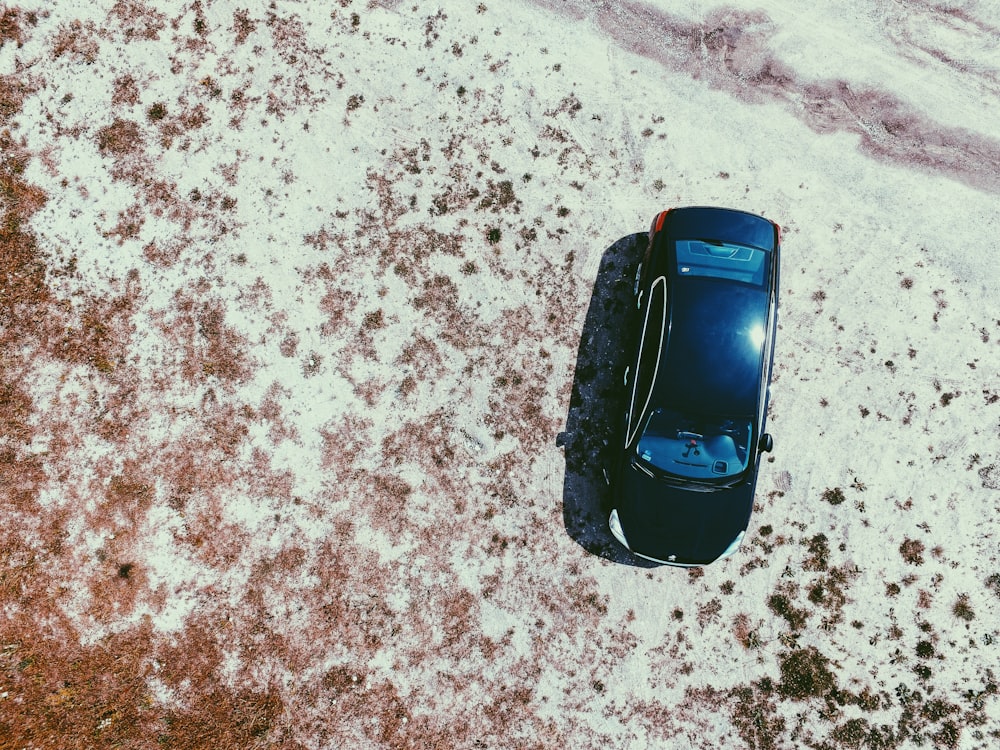 black car on white surface