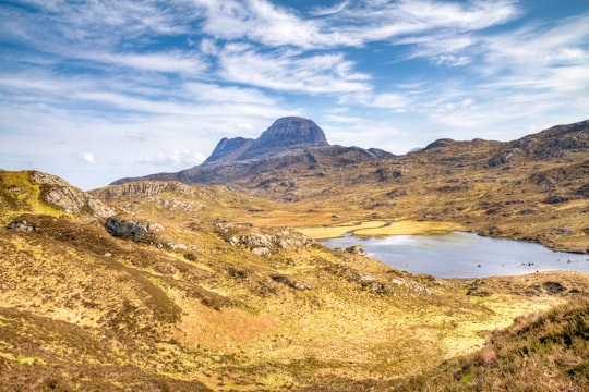 mountain during daytime in Suilven United Kingdom