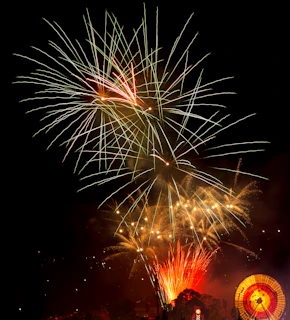 A festive scene showing free spins bonus round with animated fireworks on screen.