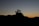 silhouette of people standing on highland during golden hours