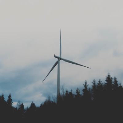 white windmill during cloudy sky