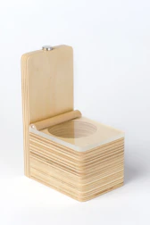 A wooden keepsake box with custom inserts and a metal logo plate on top.