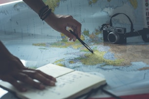 person writing on white paper