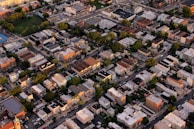 Aerial view of an urban neighborhood with diverse modern buildings.