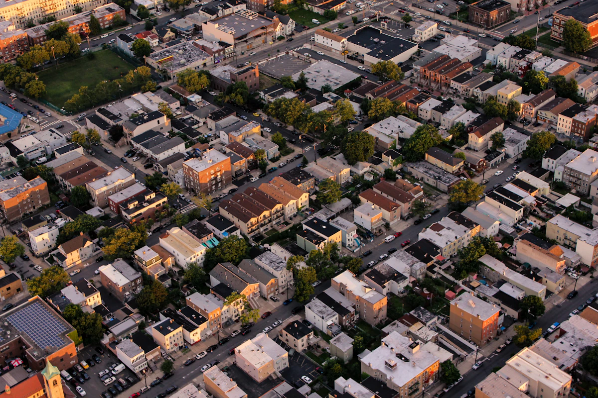 A view across an urban neighbourhood with different buildings and streets.