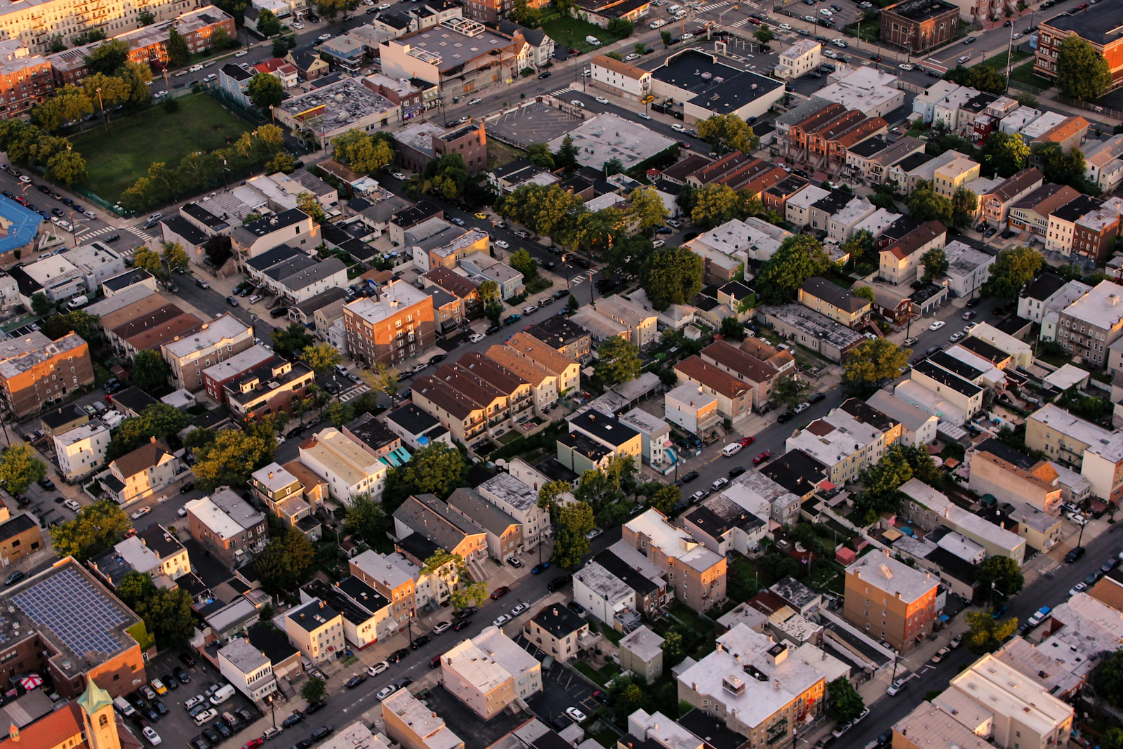 A view across an urban neighbourhood with different buildings and streets.