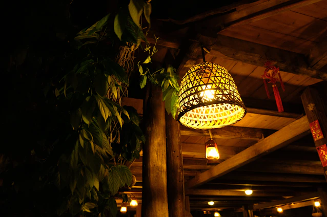 Cozy and stylish interior design showcasing warm lighting and natural materials.