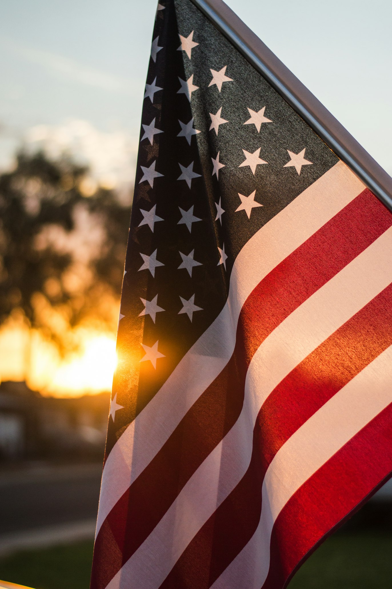 image of flag in the background with a red hue