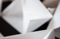 Elegant folder design with sharp lines and a balanced composition in muted tones.