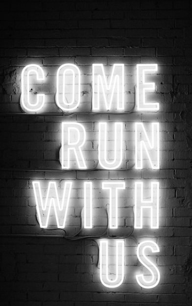 white Come Run With Us neon signage