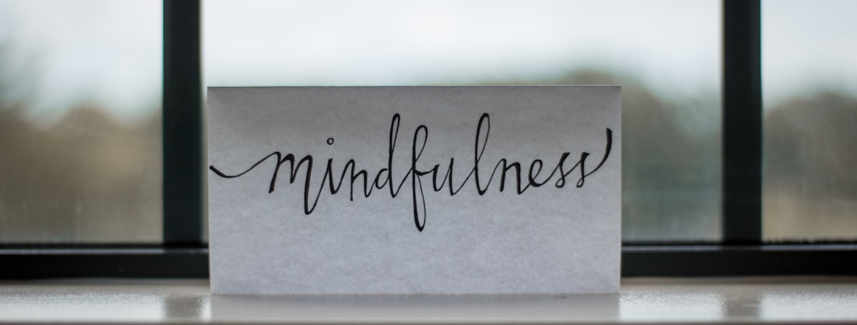 mindfulness printed paper near window