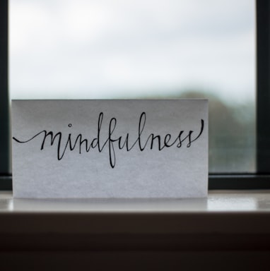 mindfulness printed paper near window