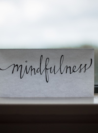 mindfulness printed paper near window