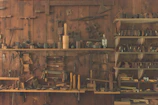 A vibrant display of assorted hand tools neatly arranged on wooden shelves inside Ramdev Traders.