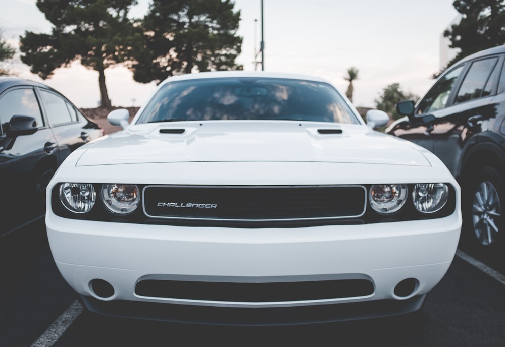 shallow focus photo of white car