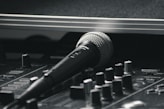 An image showcasing sound equipment and a microphone.