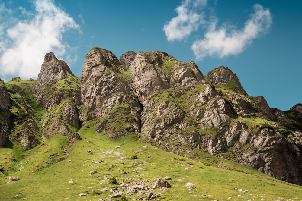 mountain under blue cloudy sky during daytime