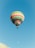 multicolored hot air balloon under blue sky
