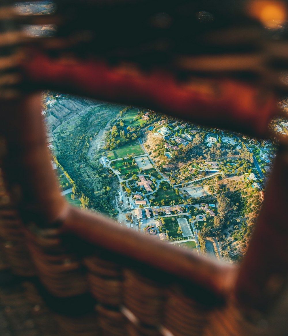 an aerial view of a city from a basket