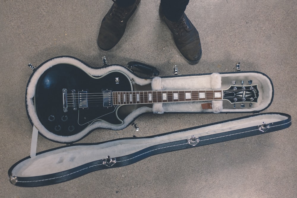 black telecaster guitar with case