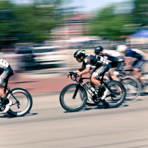 time lapse photography of bikers