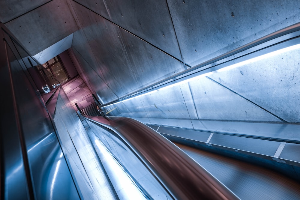 escalator in building with lights