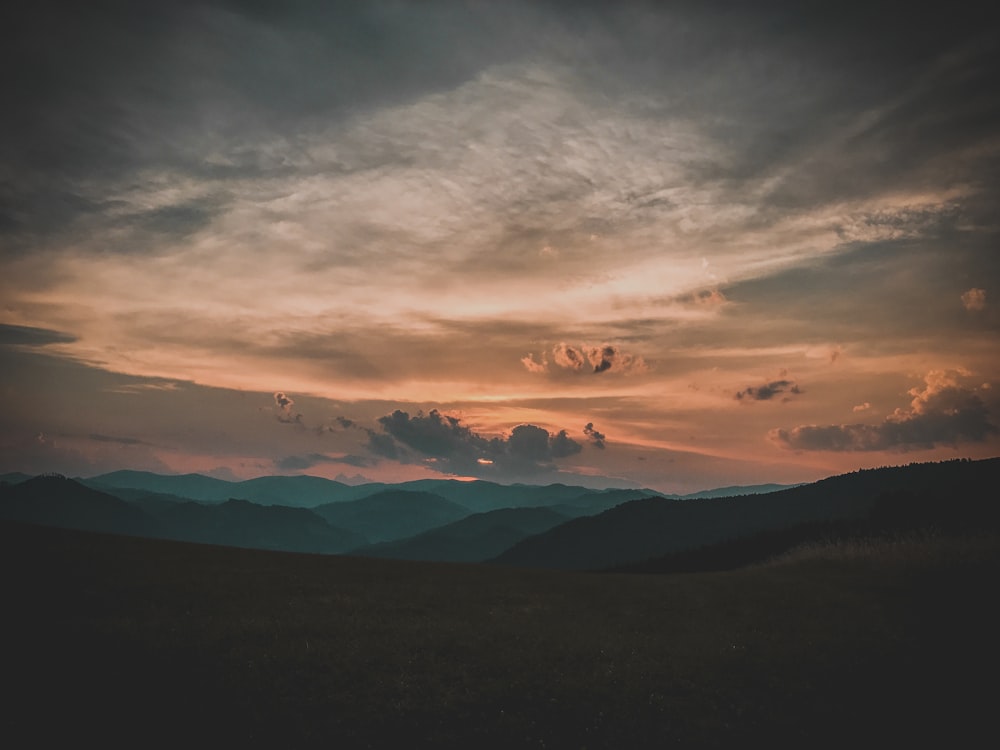 hills landscape during sunset