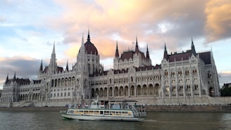 white and brown concrete cathedral building nearby sea