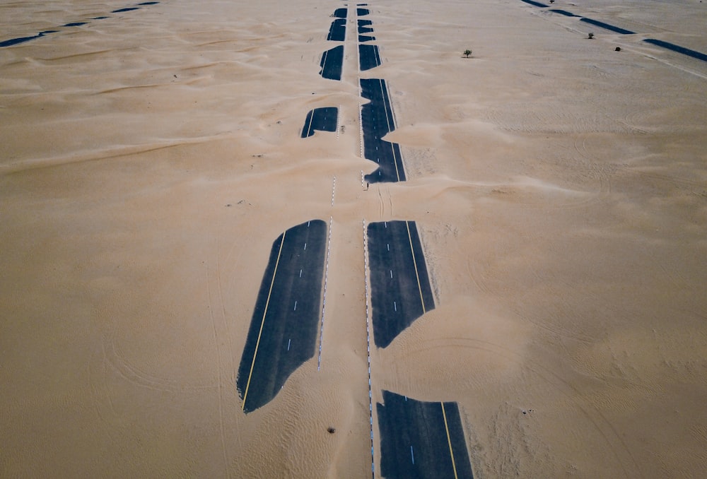 two highway road covered with sand