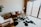 Cozy living room featuring a cowhide rug under a coffee table.