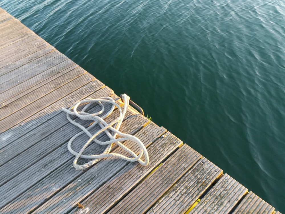 brown rope on dock bridge